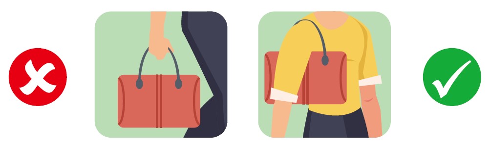 購物時，將購物袋揹在肩膀上，代替用手指握袋。