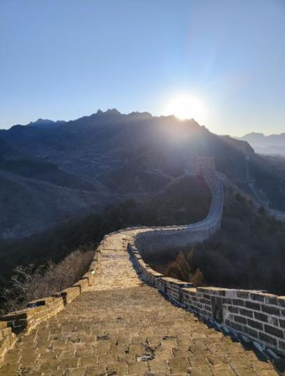 Sunrise scenery at the Simatai section of the Great Wall in Miyun district, Beijing....