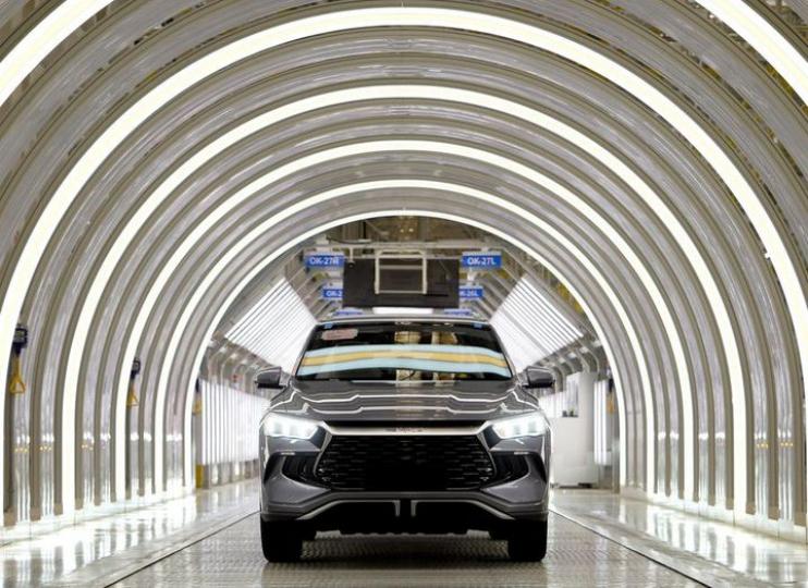 Chinese carmaker BYD reports rising revenue...