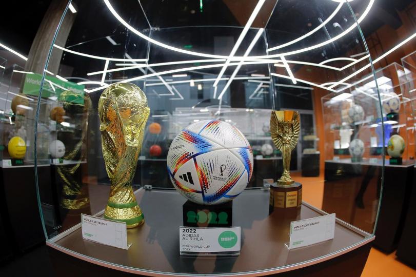 World Cup trophies and the official football...