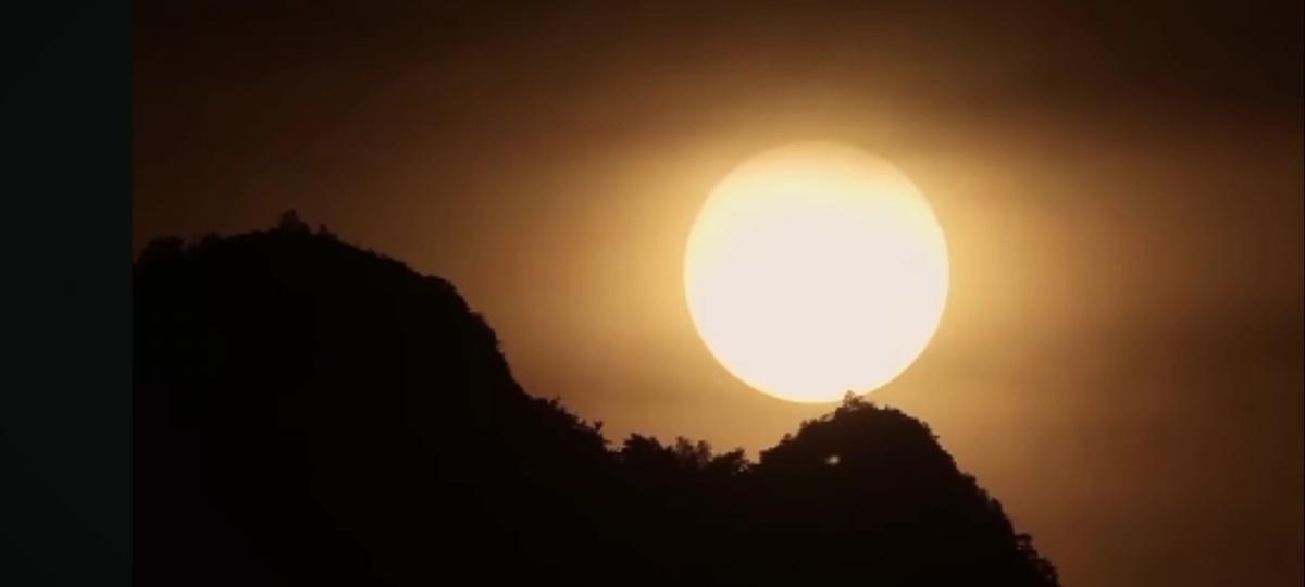 山後的
               太陽！...