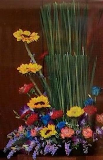 色彩繽紛的花兒

這盤七彩繽紛的花藝看來大方得體，充滿夏日陽光色彩。...