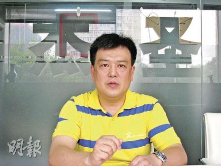 齊立新在北京經營辦理移民加拿大業務。(劉洪慶攝) 齊立新在北京經營辦理移民加拿大業務。(劉洪慶攝)