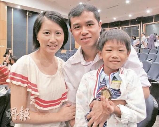 文氏夫婦及文浩謙。(梁琬珊攝) 文氏夫婦及文浩謙。(梁琬珊攝)