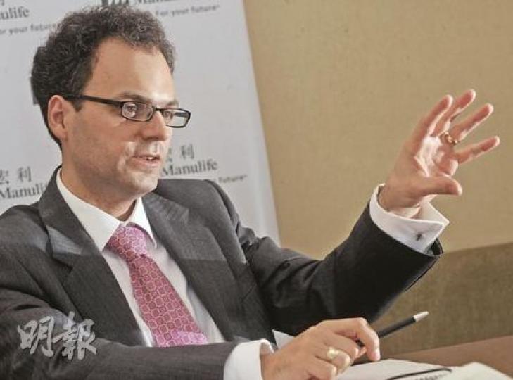 宏利資產管理Peter Mennie預料，未來5年新興國經濟增長續跑贏發達國。（劉焌陶攝）