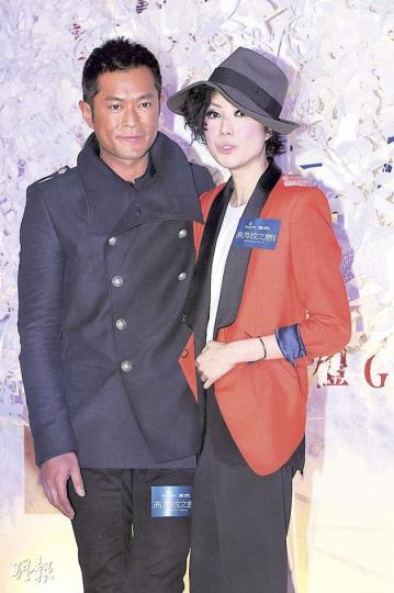Sammi古仔攬腰搭膊現身首映禮，儼如一對情侶。（攝影﹕鍾偉茵）