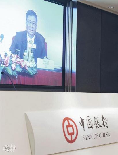 中行行長李禮輝(屏幕上)表示,未來派息比率會保持在30%至35%的合理水平。(劉焌陶攝) 中行行長李禮輝(屏幕上)表示,未來派息比率會保持在30%至35%的合理水平。(劉焌陶攝)