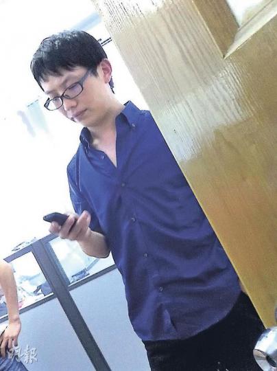 羅斌一名不願透露姓名的碩士生表示，羅有逾30年法醫經驗，而法醫報告有專業知識及操守，「必須經得起國家法治的考驗」。（明報記者攝）