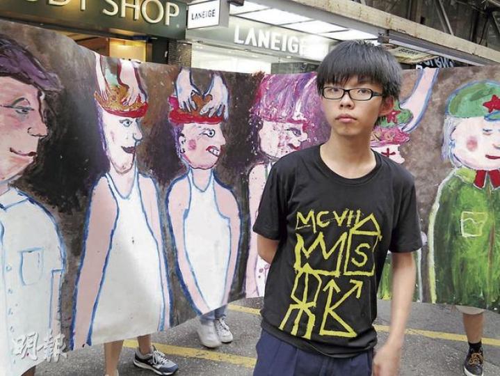 學民思潮擬於七一遊行往中聯辦，召集人黃之鋒批評警方提出多項荒謬要求，包括凌晨2時始能在中聯辦集會等，聲言不獲批便會上訴。（林耀華攝）