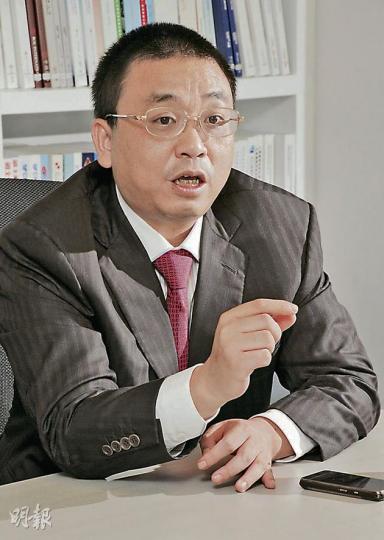 中國無線執行董事兼財務總監蔣超稱，將以低價競爭去搶hTC、摩托羅拉及諾基亞市場，目標是5年內打進全球市場前5位。（陳淑安攝）