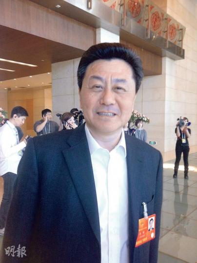 李剛笑容滿面,但記者提到香港事務,李剛話自己已調走,唔會評論嘞。(黃振豪攝) 李剛笑容滿面,但記者提到香港事務,李剛話自己已調走,唔會評論嘞。(黃振豪攝)