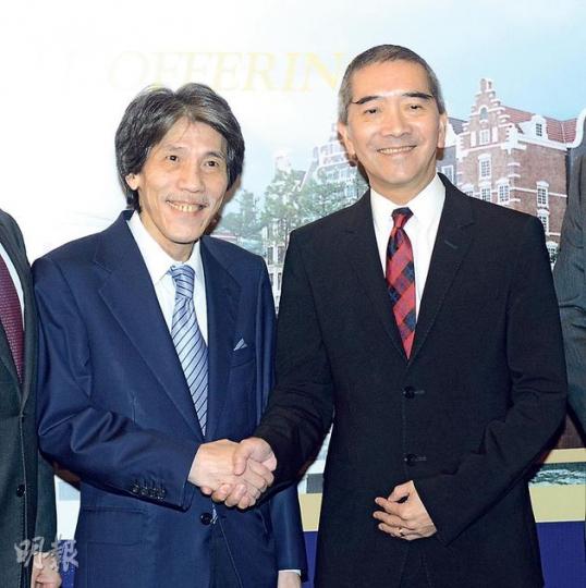 勵駿創建聯席主席周錦輝（左）及唐家榮（右），昨日在公司的投資者推介活動上合照。周錦輝稱，對公司上市有信心。（陳淑安攝）