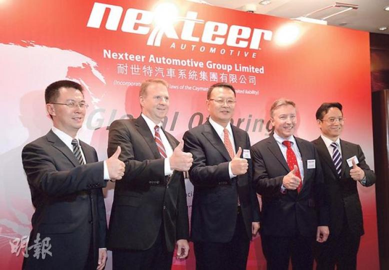 內地汽車零件生產商耐世特汽車將於下周四起招股。圖左起為耐世特戰略規劃總監宋傑，首席財務官喬•帕金斯及首席執行官趙桂斌。（盧翊銘攝）