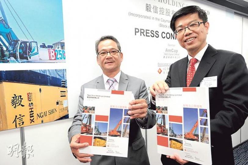 香港地基分包承建商毅信控股今日起至10月4日(星期五)招股。毅信主席黃世忠(右)稱,預計公司利潤表現在未來3年仍會受益於基建項目的增長,毛利率將維持去年水平。(尹錦恩攝) 香港地基分包承建商毅信控股今日起至10月4日(星期五)招股。毅信主席黃世忠(右)稱,預計公司利潤表現在未來3年仍會受益於基建項目的增長,毛利率將維持去年水平。(尹錦恩攝)