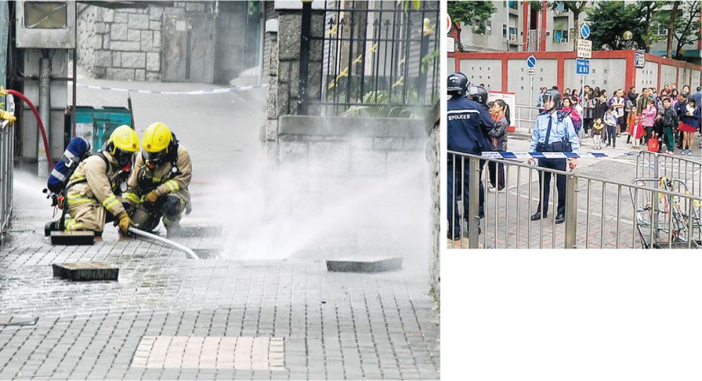 花園大廈孔雀樓對開牛頭角道昨發生地底渠道爆炸事故,消防員趕至向沙井射水,起火及爆炸原因有待調查。警方封鎖現場及疏散孔雀樓底座數十戶居民進行調查,現場一度聚集等候解封的市民。(林智傑攝) 花園大廈孔雀樓對開牛頭角道昨發生地底渠道爆炸事故,消防員趕至向沙井射水,起火及爆炸原因有待調查。警方封鎖現場及疏散孔雀樓底座數十戶居民進行調查,現場一度聚集等候解封的市民。(林智傑攝)