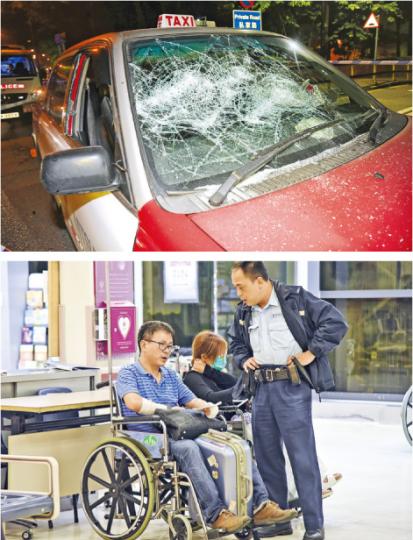 案件中涉事的士遭兩車截停，被人用鐵棍把擋風玻璃及兩邊車窗擊碎（上圖），司機亦遭打傷需送院治理（下圖）。（蔡方山攝）