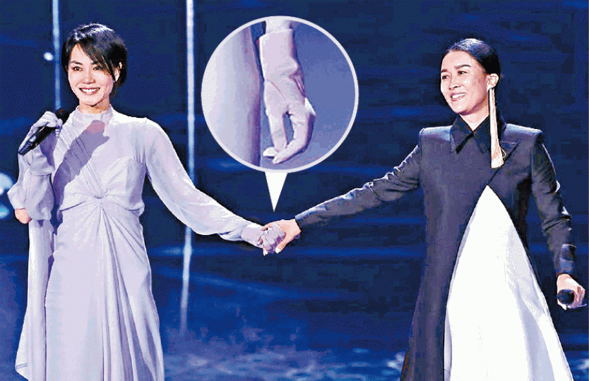 ■相隔20年,王菲再度與那英亮相春晚,但焦點落在她的手套上。■電影《重慶森林》中,王菲戴膠手套與春晚所戴的十分相似。 ■相隔20年,王菲再度與那英亮相春晚,但焦點落在她的手套上。■電影《重慶森林》中,王菲戴膠手套與春晚所戴的十分相似。