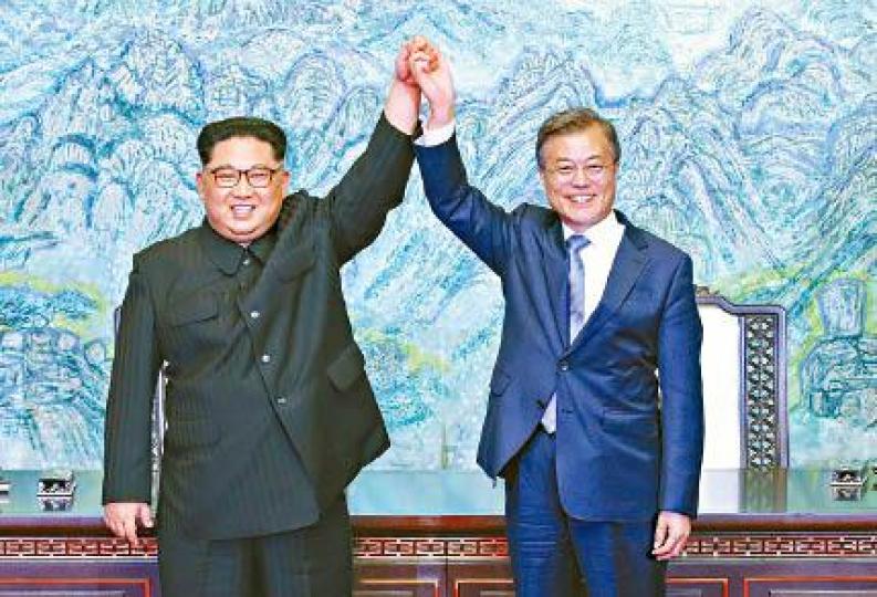 金正恩跟文在寅明日將再舉行峯會。美聯社 金正恩跟文在寅明日將再舉行峯會。美聯社