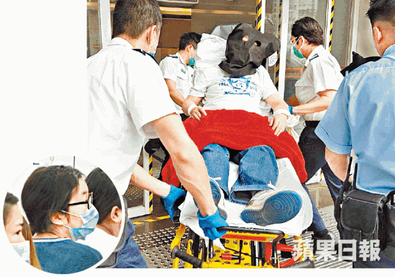 疑兇斬傷女生(圓圖),被捕後送院檢查。詹家志攝 疑兇斬傷女生(圓圖),被捕後送院檢查。詹家志攝
