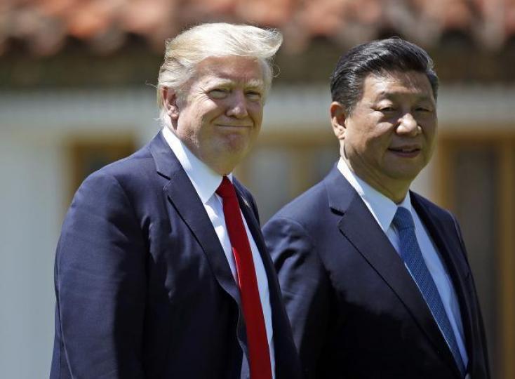 習近平（右）與特朗普本周五會面，相信談判前夕的加壓只是談判的技倆。資料圖片