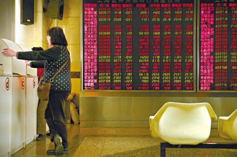 MSCI提高A股在新興市場指數的比重後，境外資金將湧入內地市場。美聯社