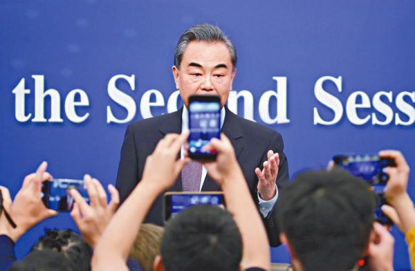 外長王毅昨出席記者會大談中美台關係。 路透社 外長王毅昨出席記者會大談中美台關係。 路透社