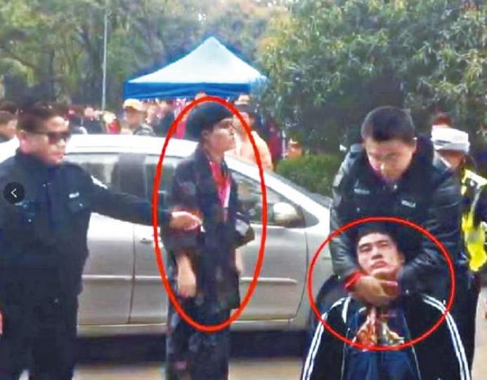 「和服」男被武大保安毆打。武漢大學櫻花盛放。 「和服」男被武大保安毆打。武漢大學櫻花盛放。