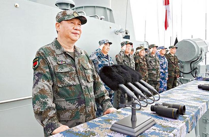 習近平去年在南海大閱兵檢閱軍隊。 習近平去年在南海大閱兵檢閱軍隊。