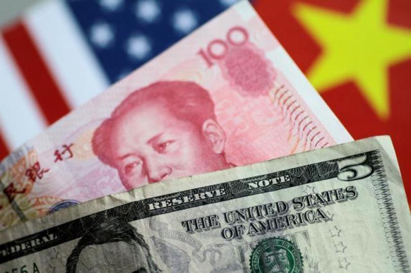 離岸投資者對人民幣看法或較悲觀,故滙價走勢比在岸價弱。資料圖片 離岸投資者對人民幣看法或較悲觀,故滙價走勢比在岸價弱。資料圖片