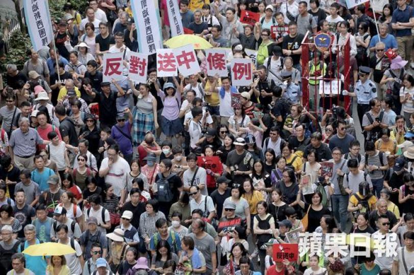 13萬市民早前上街反對政府硬推送中惡法。資料圖片 13萬市民早前上街反對政府硬推送中惡法。資料圖片