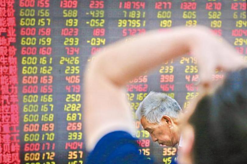 A股受貿易戰消息衝擊表現疲弱,昨微跌收場。美聯社 A股受貿易戰消息衝擊表現疲弱,昨微跌收場。美聯社