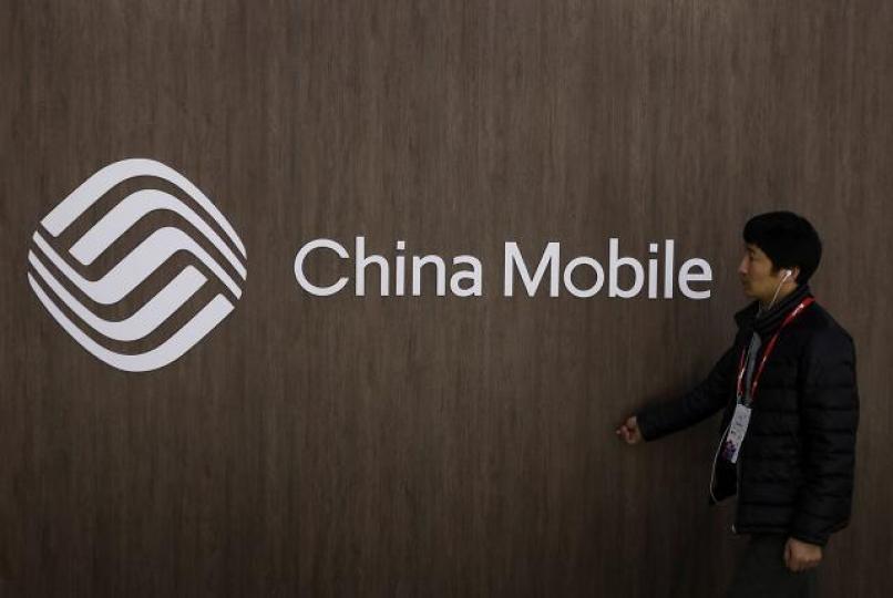 中移動在三隻國內電訊股中,PE最低,股息率最高,較為可取。資料圖片 中移動在三隻國內電訊股中,PE最低,股息率最高,較為可取。資料圖片