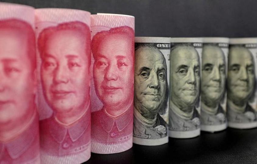 人民幣過去幾天突然急速貶值,對沖了一部份美國加徵25%的關稅。 資料圖片 人民幣過去幾天突然急速貶值,對沖了一部份美國加徵25%的關稅。 資料圖片