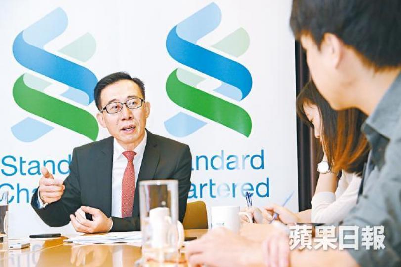 渣打嚴守敬估計今年亞洲區內發債規模將不及去年。何耀勤攝 渣打嚴守敬估計今年亞洲區內發債規模將不及去年。何耀勤攝
