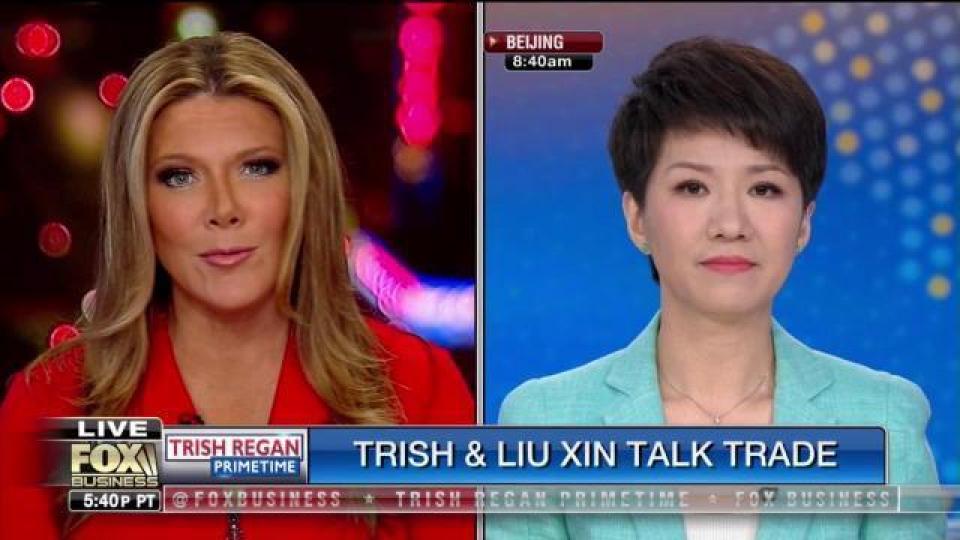 內地官媒主播劉欣日前與美國Fox主播Trish Regan隔空辯論中美貿易戰。 內地官媒主播劉欣日前與美國Fox主播Trish Regan隔空辯論中美貿易戰。