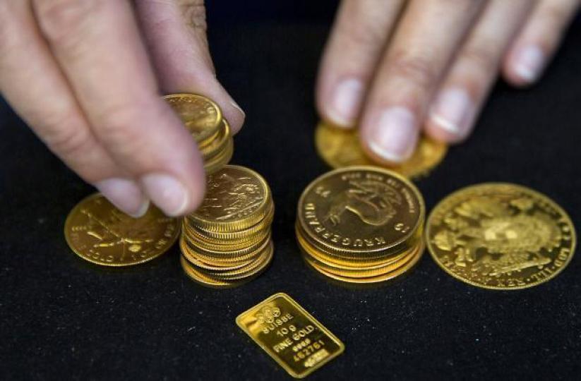 投資前景太不明朗,資金無處可去,黃金成為其中一種避險工具。 資料圖片 投資前景太不明朗,資金無處可去,黃金成為其中一種避險工具。 資料圖片