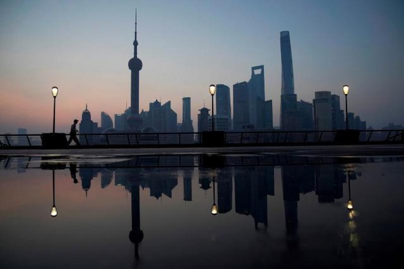 IMF下調中國今明兩年經濟增長預測0.1個百分點。資料圖片 IMF下調中國今明兩年經濟增長預測0.1個百分點。資料圖片